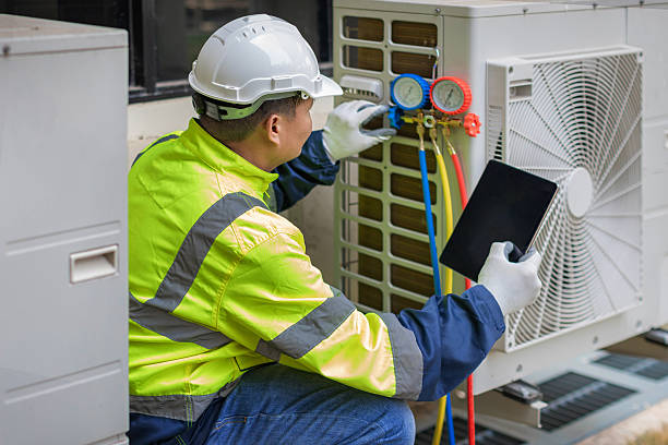 Professional Heat Pump Repair technician working in Parkton, MD